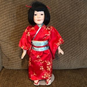 Japanese doll in red Jumono
